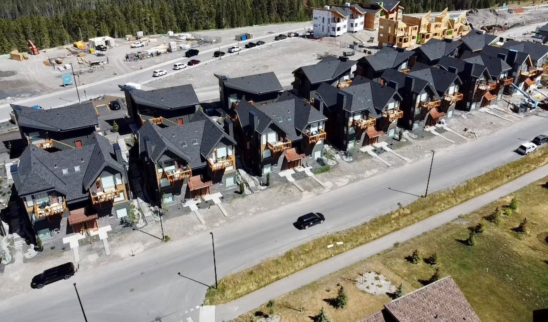 Ashton Construction Services (ACS) Projects - The Slopes at Stewart Creek - Canmore, Alberta - aerial